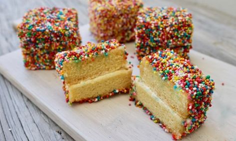 A colourful twist on an Aussie classic these rainbow lamingtons will remind you of your childhood birthday party. Tim Tam Cheesecake, Recipes Kids Will Love, Childhood Birthday, Sundae Cupcakes, Whipped Icing, Meals Kids Love, Chocolate Crackles, Smores Cake, Cake Rack