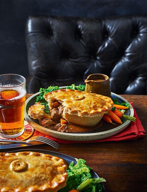 This steak and ale pie recipe is a labour of love but it's worth it! The filling is cooked the day before and left overnight for the flavour to develop. The pastry is made with beef dripping, which makes it not only full of flavour but also perfectly crisp and melt-in-the-mouth. Serve with cabbage and carrots Steak And Ale Pie, Lamb Pie, Cabbage And Carrots, Ale Pie, Veggie Pies, Savoury Pies, British Cooking, Steak And Ale, Beef Pies