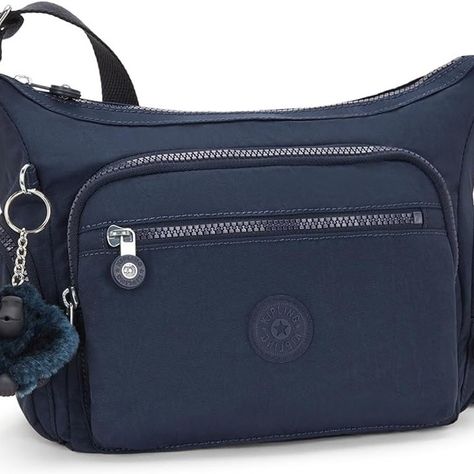 Kipling Gabbie S Messenger Bag 🌟 Stay organized in style with the Kipling Gabbie S Messenger Bag—designed for the modern-day trendsetter! 🔹 Key Features: Multiple zip compartments Adjustable crossbody strap Water-resistant nylon 🔗 Shop Now: https://amzn.to/3XpDK6T #Kipling #MessengerBag #TrendyProducts #TravelEssential Stay Organized, Staying Organized, Crossbody Strap, Travel Essentials, Trend Setter, In Style, Messenger Bag, Bags Designer, Water Resistant