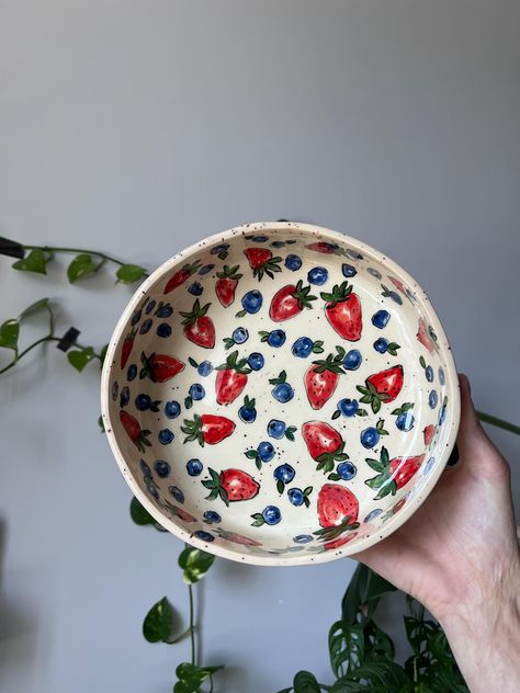 This Hand Painted Deep Salad Plate is a beautifully crafted piece of ceramic art, perfect for serving salads or as a versatile vegetable bowl. Each plate is meticulously hand-painted with a vibrant tomato design, adding a touch of nature's bounty to your table setting. Made from durable stoneware, this plate is not only visually appealing but also practical, being food-safe and suitable for everyday use. It makes a thoughtful and unique ceramic gift for loved ones or a charming addition to your own kitchenware collection. Ideal for those who appreciate handcrafted items with a personal touch. 19.5 cm diameter / 1200 ml 7.67inches diameter / 40.58 fl oz It's an absolutely unique ceramic deep plate because all my creations are made without a pottery wheel or any forms. So please note before Plates With Fruit Design, Plates Pottery Painting, Pick And Paint Pottery Ideas, Paint Your Own Bowl Ideas, Pasta Pottery Painting, Pottery Designs Bowl, Cool Bowls Ceramics, Fruit Plate Pottery, Pottery Painting Salad Bowl