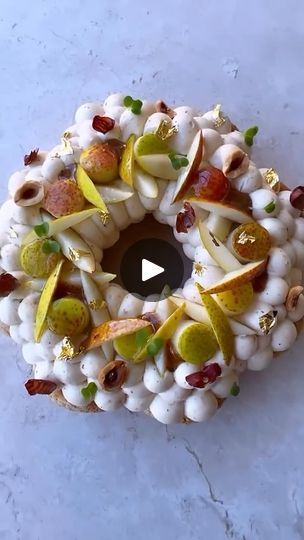 4.3K views · 119 reactions | Pear & Hazelnut Choux Crown 👑🌰 by @nourkandler. ❤️ A heavenly blend of choux au craquelin, pear & vanilla confit, hazelnut praliné, whipped hazelnut ganache, and fresh pear creating an edible masterpiece. 🥰 . . . #pastryart #pastrychef #chef #pastry #pastryporn #pastrychefs #pastrychefsofinstagram #pastrycheflife #pastrylove #pastrylover #pastrypassion #pastrylife #pastryarts #pastryinspiration #instapastry #patisserie #patisseries #dessert #desserts #dessertporn #dessertpics #pastrydesign #pastrydelights #pastryaddict #chocolatier #baker #instabaker #bakerylife #bakersofinstagram #dessertmasters | Pastry Arts Magazine | FKJ · We Ain't Feeling Time Hazelnut Ganache, Pastry Design, Hazelnut Praline, Arts Magazine, Pastry Art, Chef Life, Pastry Chef, Hazelnut, Pastry