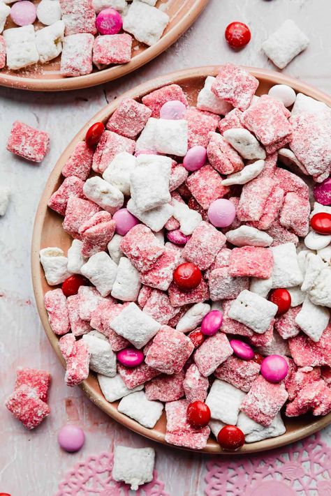 These Valentine's Day Muddy Buddies are bright in color and taste! Coated in powdered sugar and strawberry cake mix, this delicious and festive treat is perfect for enjoying yourself or gifting to others. Peanut Butter Muddy Buddies, Muddy Buddies Recipe, Valentines Treats, Easy To Make Snacks, Puppy Chow Recipes, Red Velvet Cake Mix, Strawberry Cake Mix, Chex Mix Recipes, Muddy Buddies