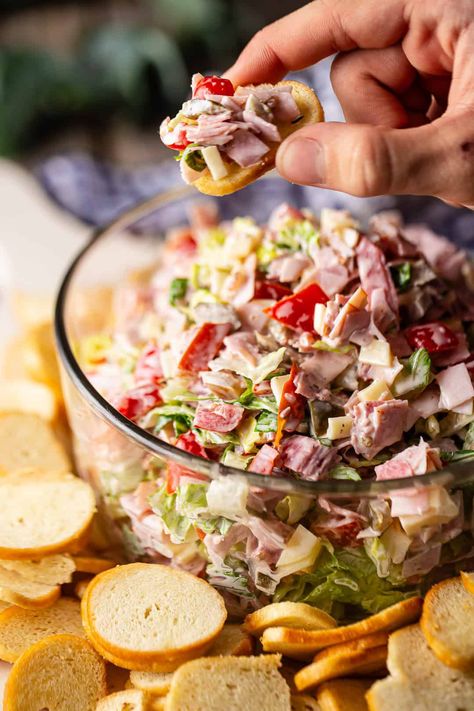 An old favorite! This easy hoagie dip recipe is just like an Italian sub, but in dip form! Loaded with hearty meats, cheese, and veggies. Chopped Italian Dip, Italian Hoagie Salad Recipes, Lunch Dips Easy Recipes, Italian Hoagie Dip Recipe, Sub Salad Italian, Italian Sub Dip Recipe, Meat Dip Recipes, Italian Dips Appetizers, Italian Sub Dip