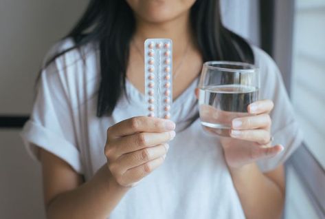 Woman holding birth control pills ready to take them with a glass of water for the first time Birth Control Options, Birth Control Pill, Birth Control Pills, Reproductive Health, Birth Control, Getting To Know You, Side Effects, Glass Of Milk, Be Aware