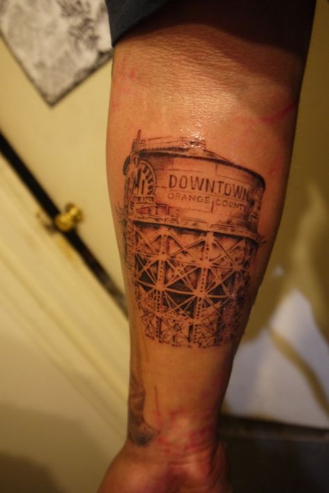 downtown orange county water tower tattoo Water Tower Tattoo, Tower Tattoo, California Tattoo, Inner Arm Tattoo, Ancient Tattoo, Tattoo Convention, Miami Dade County, Tattoo Parlors, Aesthetic Tattoo