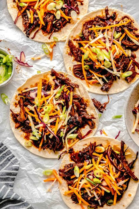 Pork Tortilla Wraps, Slow Cooker Korean Pork, Korean Pork Tacos, Asian Tacos, Asian Ramen Salad, Tangy Slaw, Asian Pork Tenderloin, Slow Cooker Pork Tacos, Korean Tacos