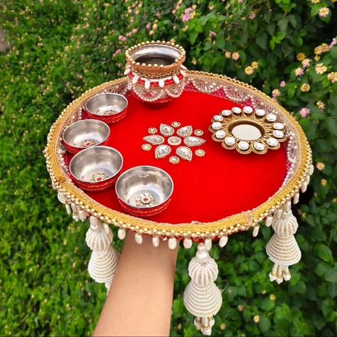 Puja thali on red velvet with kundan Diya 🪔 and pearl Hanging 🥰 DM us for more details or WhatsApp us on 9867422790 Thali Decoration Ideas For Diwali, Puja Thali Decoration Ideas, Puja Thali Decoration, Pooja Thali Decoration Ideas, Thalposh Design, Diy Engagement Ring, Janmashtami Special, Coconut Decoration, Puja Thali