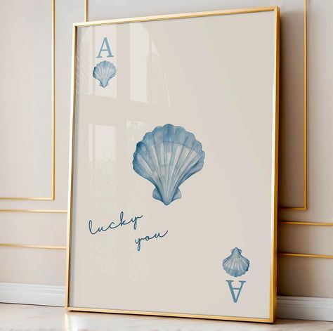 Blue Seashell Print, Coastal Beachy Room Decor, Lucky You Print, Light Blue Prints, Playing Card Print, Apartment Wall Art, Beachy Wall Art Elevate your coastal cowgirl aesthetic with this charming seashell print, perfect for adding a beachy touch to your college dorm or apartment wall art. Ideal for creating a laid-back, coastal atmosphere, this beachy print is the perfect addition to any space! Key Features * Digital download - simply print, frame and hang! * Purchase includes 5 size ratios to Coastal College Apartment, Coastal Feature Wall, Coastal Apartment Decor, Coastal Apartment, Coastal Room Decor, Beachy Room Decor, Beachy Wall Art, Apartment Wall Art, Seashell Print