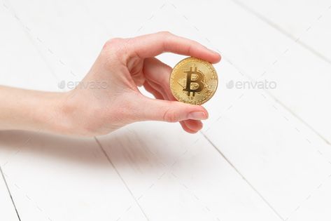 Holding Coin Reference, Business Logo Inspiration, Bitcoin Faucet, Responsive Website Template, Body Anatomy, Business Photos, Gold Coin, Hand Holding, Gold Coins