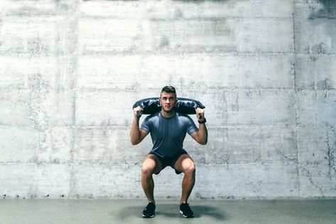 Squat Exercises for Men | Livestrong.com Proper Squat Form, Squat Exercises, Bulgarian Bag, Types Of Squats, Soleus Muscle, Benefits Of Squats, Exercises For Men, Bag Workout, Best Resistance Bands