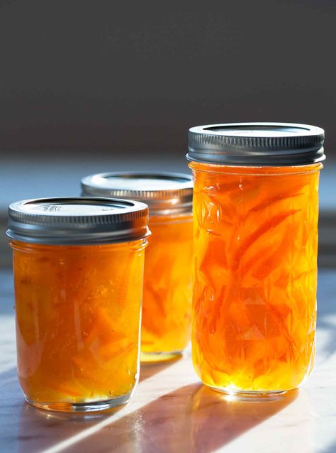 Seville Orange Marmalade ~ Homemade Seville orange marmalade, made with fresh Seville oranges, lemons, and sugar. No commercial pectin needed! ~ SimplyRecipes.com #canning #jamsandjellies #marmalade #orange Sweet Orange Marmalade Recipes, Canning Orange Marmalade, Easy Orange Marmalade Recipe, Peach Orange Marmalade Recipe, Bitter Orange Marmalade, Sweet Spreads, Making Marmalade, Homemade Marmalade, Marmalade Jam