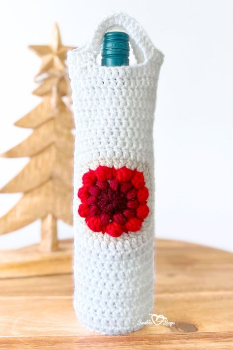 Make this free, easy Nordic Christmas crochet wine bottle holder! Perfect for beginners, this simple, quick pattern creates a festive wine bottle cozy. Use it as a gift bag, stylish tote, or reusable carrier. This diy project is ideal for a thoughtful handmade gift and adds a cozy aesthetic to the holidays. Explore this fun wine bottle cover pattern and create unique bottle cozies today! Wine Bag Pattern Free, Crochet Wine Bag, Wine Bag Pattern, Crochet Wine, Bottle Cozy, C2c Crochet Pattern Free, Crochet Animal Hats, Bottle Cozies, Crochet Baby Blanket Free Pattern