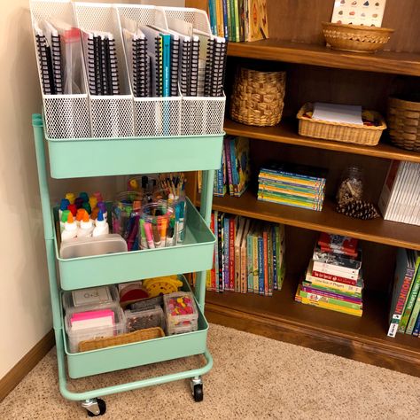 Organizing homeschool with a rolling cart...follow along for more Homeschool tips tricks and advice Homeschool Trolley, Art Supply Cart Organization, Teacher Utility Cart, Homeschool Cart Storage, 3 Tier Rolling Cart Ideas Classroom, Teacher Rolling Cart Organization, Homeschool Carts, Homeschool Cart Organize, Teacher Cart Organization