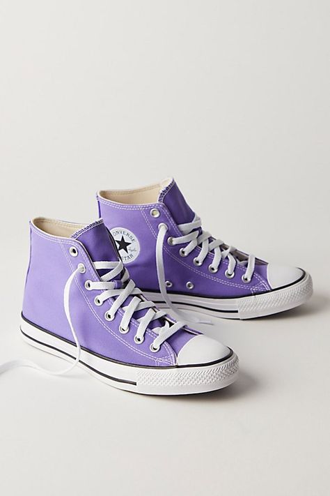 **Fit:** This style is in unisex sizing so a men's size 4 is a women’s size 6. Classic canvas high top Chuck Taylors. | Chuck Taylor All Star Hi Top Converse Sneakers at Free People in Purple, Size: US 5.5 M Converse Shoes Light Purple, Converse Shoes Purple, Bright Converse, Cute High Top Shoes, Purple Converse Aesthetic, Converse Colors, Lilac Converse, Purple Outfit Ideas, Lavender Converse