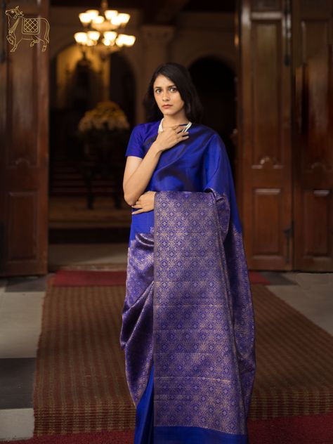 This deep blue kanchipuram silk saree has rising brocade work woven all over the body. Blue Kanchipuram Saree, Shaadi Outfits, Elegant Dressing, Silk Saree Kanchipuram, Dresses Traditional, Wedding Sari, Indian Dresses Traditional, Wedding Sarees, Blue Saree