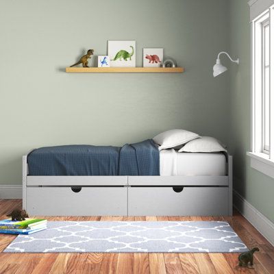 This storage platform bed combines stylish comfort and under-bed storage. It's made of solid and engineered wood in a twin bed size. This bed features a low headboard and footboard that frames the mattress (not included). Two under-bed drawers offer clothing, toy, and shoe storage options on one side. The other side fits up against a wall or in a corner to make the most of space in your bedroom, child's room, or dorm room. We love that this bed frame includes a slat kit that supports a twin matt Platform Bed Storage, Twin Storage, Bed Frame Platform, Studio Bed, Storage Platform Bed, Under Bed Drawers, Storage Platform, Twin Platform Bed, Slatted Headboard