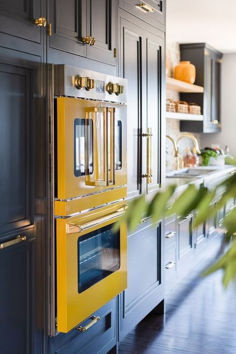 Yellow Appliances, Dark Stained Wood Floors, Cute Kitchen Decor, Taupe Kitchen, Woven Dining Chairs, Indoor Outdoor Kitchen, House Beautiful Magazine, Beautiful Kitchen Designs, Pretty Kitchen