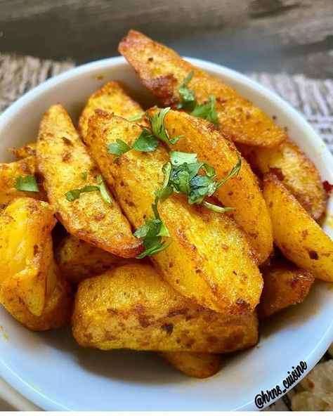 Quick Simple n Easy Cuisine on Instagram: "Spicy potato wedges... So quick n easy to make. These can be made in airfryer or oven Air Fried Masala Wedges By Hajira Farook @hrns_cuisine 4 potatoes peeled and cut in wedges Marinate in the following 1/4 cup oil 1 heaped teaspoon red masala 1/2 teaspoon crushed dhania (coriander seeds) 1/2 teaspoon crushed jeeru (cumin) 1/4 teaspoon turmeric 1/2 teaspoon red chili powder 1/2 teaspoon paprika A pinch of whole jeeru (cumin) Salt to taste Spicy Potato Wedges, Masala Fries, Red Chili Powder, Potato Wedges, Peeling Potatoes, Coriander Seeds, Red Chili, Chili Powder, Main Meals