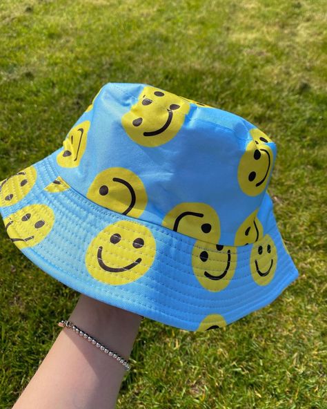 Bucket hats and clothing. on Instagram: “🙃Blue smiley face bucket hat. 😀£13!!” Smiley Face Clothing, Blue Smiley Face, Bucket Hat Outfit, Happy Photos, 14th Birthday, Smiley Faces, Face Cloth, Outfits With Hats, Cute Hats