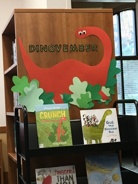 November book display Monthly Book Displays, School Library Displays Ideas, Library Christmas Tree Ideas, Author Of The Month Display, November Library Display Ideas, Dinosaur Library Display, Fall Into A Good Book Display, Thanksgiving Book Display, School Library Decorations