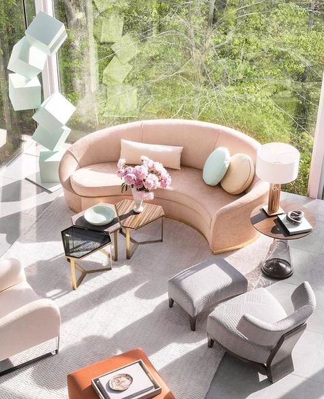 Evoking Spring with sensuous shapes, hues of salmon, mint and gray. By Donghia Curve Sofa, Pastel Interiors, Pastel Interior, Living Room Images, Center Tables, Outside Furniture, Round Sofa, Interior Living Room, Parisian Apartment