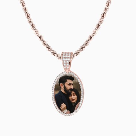 Elevate your keepsakes with our Iced Oval Photo Necklace. This custom piece features a beautiful oval-shaped pendant, adorned with shimmering cubic zirconia stones, encasing your favorite photo. A timeless way to keep your loved ones close and add a touch of sparkle to any outfit. Perfect for gifting or personalizing your collection with meaningful memories! #OvalPhotoNecklace #IcedNecklace #CustomJewelry #PersonalizedPendant #MemoryKeepsake #UniqueJewelry #BespokeGift #GiftOfLove #PhotoPend... Necklace With Picture Inside, Necklace With Picture, Arabic Jewelry, Medical Jewelry, Bangle Ring, Photo Necklace, Personalized Pendant, Memorial Keepsakes, Elegant Necklaces