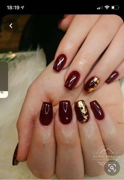 Burgundy White And Gold Nails, Gold Flaked Nails, Red Nails With Foil Flakes, Red With Gold Flakes Nails, Maroon Nails With Gold Flakes, Deep Red Nails With Glitter, Red And Gold Flake Nails, Red And Gold Manicure, Deep Red Gel Nails