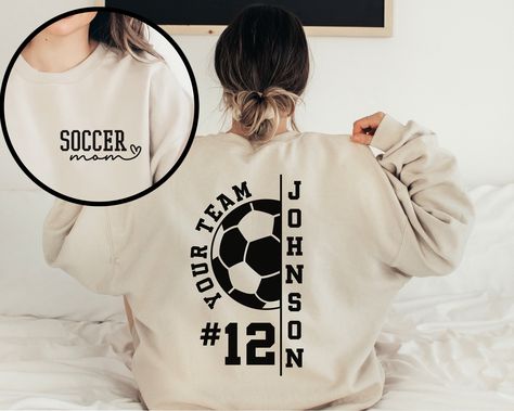 Customize this soccer shirt to meet your needs! Choose from short sleeve, long sleeve, hoodies, and crewneck sweatshirts and add your mascot/team, name, and number! Other color options and styles are available. If you don't see what you're looking for send us a message! The shirts are a UNISEX retail fit - they are more of a relaxed fit and tend to run a little large on women and those with a smaller frame . Make sure to see the size charts (last images) to confirm the best fit for you. We recom Soccer Shirts Designs, Soccer Dad Shirt, Soccer Team Shirts, Soccer Sweatshirt, Sports Mom Shirts, Team Sweatshirts, Soccer Mom Shirt, School Spirit Shirts, Soccer Shirt