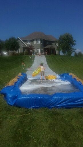 Homade slip and slide Diy Slip And Slide, Slip N Slide, Water Party, Backyard Playground, Backyard Games, Slip And Slide, Summertime Fun, Backyard Fun, Water Slide