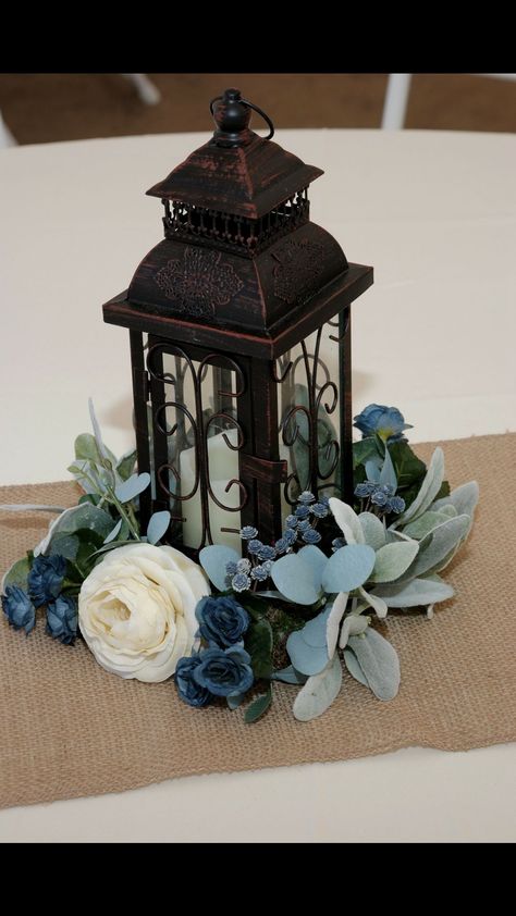 Rustic Wedding Decor Dusty Blue, Rustic Blue Centerpieces, Navy Blue Rustic Wedding Decorations, Slate Blue Centerpieces Wedding, Rustic Wedding Decor Navy Blue, Rustic And Blue Wedding, Centerpieces Wedding With Lanterns, Blue Wedding Centerpieces Round Table, Navy Rustic Wedding Decor