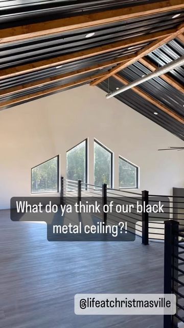 Black Ceiling With Beams, Metal Ceiling Barndominium, Black Steel Ceiling, Black Ceiling Barndominium, Barndominium With Black Ceiling, Finished Metal Building Interior, Bedrooms With Black Ceiling, Barndominium Black Ceiling, Metal Building Remodel