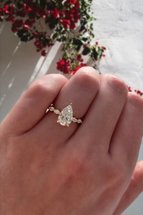 18k yellow gold engagement ring, pear shaped wedding ring, round and marquise side stone setting, hidden halo Vintage Pear Shaped Wedding Rings, Wedding Ring Pear Shaped, Engagement Rings Astetic, Teardrop Shape Ring, Marquise Vs Pear Engagement Ring, Pear Rings Engagement Wedding Set, Pear Accent Engagement Ring, Pear Or Oval Engagement Ring, Teardrop Rings Engagement