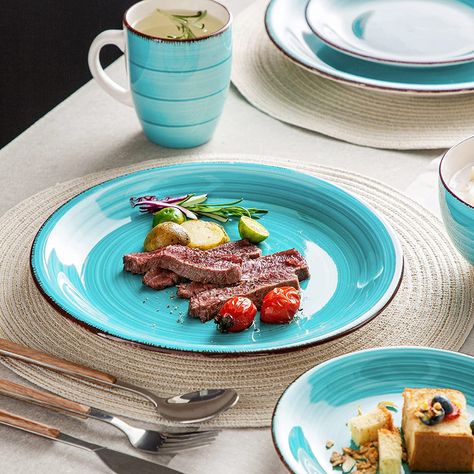 "Add a pop of color to your dining table with the vancasso Bella Dinnerware Set! This 16-piece stoneware set includes dinner plates, salad plates, bowls, and mugs for a complete service for 4. With a beautiful teal color and microwave and dishwasher safe design, this set is perfect for everyday use or special occasions." Stoneware Dinner Sets, Ceramic Dinnerware Set, Stoneware Dinnerware Sets, Stoneware Dinnerware, Ceramic Dinnerware, Porcelain Dinnerware, Dinner Sets, Blue Ceramics, Dessert Plate