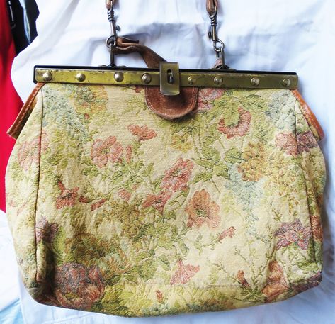 vintage carpet bag tapestry floral brocade botanical flowers vtg 1980s doctors roses peony metal framework bluebell italy roses freesia by aDistantMirror on Etsy https://www.etsy.com/listing/524850712/vintage-carpet-bag-tapestry-floral Vintage Green Top Handle Shoulder Bag, Vintage Green Pouch Shoulder Bag, Vintage Green Bag With Removable Pouch, Pre-owned Vintage Tote Shoulder Bag, Vintage Bags With Gold-tone Hardware In Signature Coated Canvas, Tan Background, Doctor Bag, Carpet Bag, Vintage Tapestry