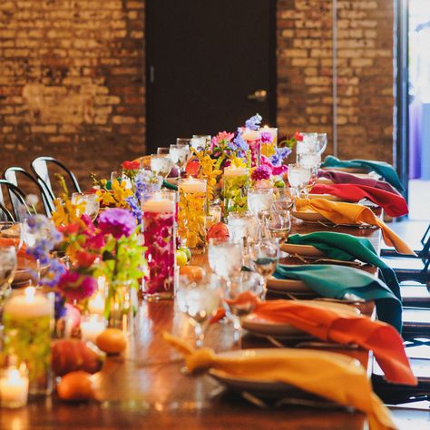 table set-up with multicolor table napkins and multicolor flowers for centerpiece #colorful #colorfulevent #multicolor #creative #tablesetup Alternating Napkin Colors Wedding, Multicolour Wedding Theme, Multicolor Wedding Decor, Colorful Napkins Wedding, Colorful Indoor Wedding, Colorful Wedding Table Decor, Colorful Table Setting Wedding, Colorful Wedding Table Settings, Colourful Table Setting