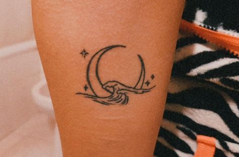 340+ Beach Tattoo Designs (2023) - TattoosBoyGirl Moon And Sea Tattoo Minimalist, Star And Sea Tattoo, Moon And Beach Tattoo, Sea And Stars Tattoo, Sea And Moon Tattoo, Moon Beach Tattoo, Ocean And Moon Tattoo, Star Of The Sea Tattoo, Sea Minimalist Tattoo