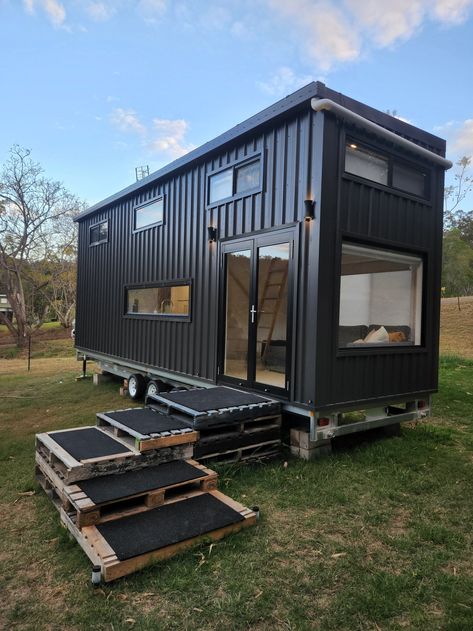 This Tiny House is Ideal for Remote Workers Black Aluminum Windows, Wide Tiny House, Vj Panelling, Aluminum Windows, Floor Boards, Casa Container, House Features, Aluminium Windows, Remote Workers