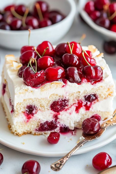 Heaven on Earth Cake is a delightfully simple layered dessert crafted with ready-made ingredients. It features layers of fluffy angel food cake, sweet cherry pie filling, smooth vanilla pudding, and airy whipped topping, all finished with a sprinkle of sliced almonds. Utilizing canned cherry pie filling offers a tasty shortcut for this dessert. Explore other Layered Angel Food Cake, Canned Cherry Pie Filling, Cherry Almond Cake, Canned Cherry Pie, Heaven On Earth Cake, Berry Pie Filling, Slow Cooker Salmon, Cherry And Almond Cake, Angel Food Cake Desserts