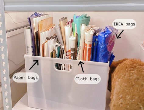 Shopping Bags Organization, Storing Paper Bags, Paper Bags Storage, Organizing Reusable Bags, Paper Grocery Bag Storage, Organizing Shopping Bags, How To Store Reusable Shopping Bags, How To Organize Shopping Bags, Reuseable Bag Storage Ideas