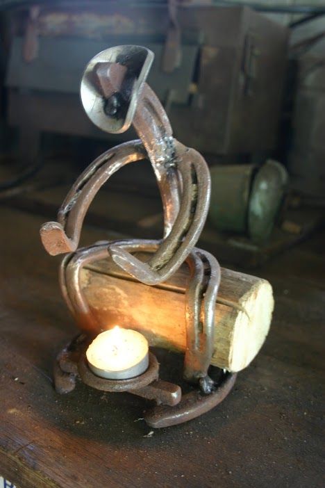 Cowboy candle holder Metal Sculpture Artists, Welding Crafts, Horseshoe Projects, Horseshoe Decor, Horseshoe Crafts, Welding Art Projects, Horse Shoes, Horseshoe Art, Metal Welding