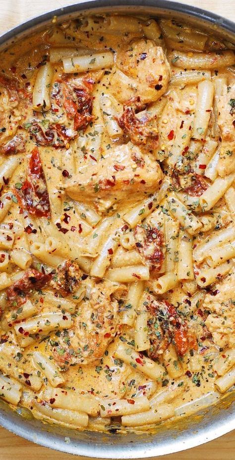 Creamy Sun-Dried Tomato Pasta with Chicken and Mozzarella Sauce - in a stainless steel pan. Chicken Pasta With Cream Cheese, Pasta With Cream Cheese, Easy Cajun Chicken Pasta, Easy Cajun Chicken, Using Basil, Chicken Mozzarella Pasta, Pasta Recipes Video, Chicken Mozzarella, Sun Dried Tomato Pasta