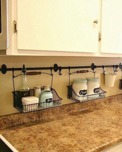 #25. Use your backsplash to store things that would otherwise be taking up valuable counter space! | 29 Sneaky Tips For Small Space Living Hanging Curtain Rods, Camper Organization, Small Kitchen Organization, Bakery Ideas, Apartment Organization, Cottage Ideas, Saving Ideas, Kitchen Makeover, Small Space Living