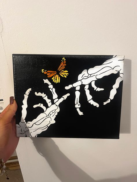 skeleton, butterfly, hands, hand-painted, canvas, canvas painting, halloween, halloween art, trendy, artsy, painting Split Canvas Painting Ideas, Painting Ideas On Canvas Butterfly, Skeleton Hand Painting, Canvas Painting Halloween, Butterfly Hands, Skeleton Painting, Skeleton Butterfly, Artsy Painting, Sunset Canvas Painting