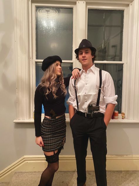 Couple Halloween Costume Cop And Prisoner, Barbenheimer Couple Costume, Gangster Costume Couples, Paparazzi Halloween Costume, Pesky Blinders Couple Costume, Trendy Couples Costumes, Diy Bonnie And Clyde Costume, Best Couples Halloween Costumes 2022, Basic Couple Halloween Costumes