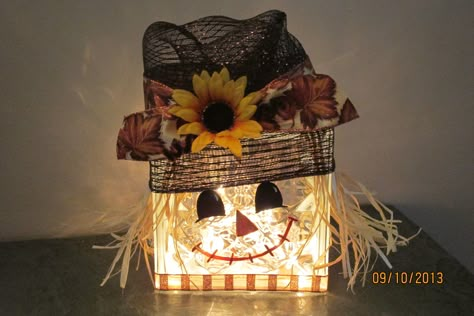 Scarecrow lited glass block - hat is made of deco mesh wrap Scarecrow Glass Block, Lighted Glass Blocks Diy, Christmas Glass Blocks, Decorative Glass Blocks, Glass Block Crafts, Lighted Glass Blocks, Cricut Christmas Ideas, Fall Decor Diy Crafts, Christmas Craft Fair