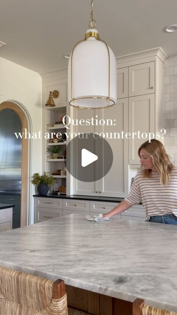 Leah White on Instagram: "FOLLOW @white.at.home and SAVE this post so you can refer back to the details about my countertops! ✨  Want a timeless kitchen design? Choose a Natural Stone Counterop!   Island: Honed Shadow Storm Marble  Perimeter and Pantry: Leathered Absolute Black Granite  At the time we were building, most people were installing Quartz countertops, and our builder tried to warn me not to choose marble.  Guess what, the heart wants what the heart wants 👏🏻   I knew there was no other option for me in my kitchen than natural stone. The organic, natural feel from having a piece of the earth in your kitchen cannot be matched by a man made material.  I love my countertops and would choose them time and time again!   As always, let me know if you have any questions, I love to hea Black Quartz With White Veining, Shadow Storm Countertops, Contrasting Island Countertop, Thunder White Granite Countertops, Mixed Countertops Kitchen, Dark Quartz Kitchen Countertops, Shadow Storm Marble, Honed Quartz Countertops, Kitchen Island Stone