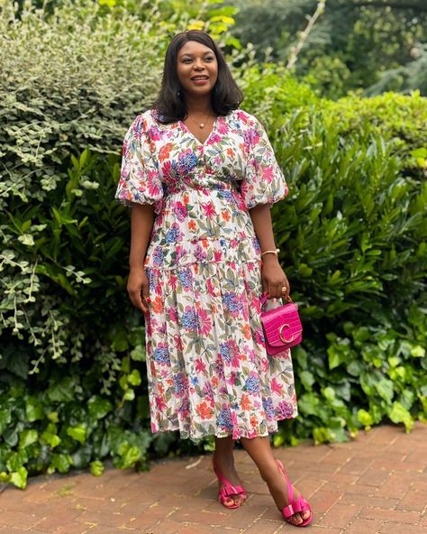 This stunning dress is perfect for making a statement 🌸 @lovinlown looks absolutely gorgeous in our floral midi dress with puff sleeves. She styles it with statement pearl jewellery, a pink bag and matching pink heels. Code: d518478 #IzabelLondon #Dress #GRWM Dress With Puff Sleeves, African Maxi Dresses, Pearl Jewellery, Pink Heels, Floral Midi Dress, Stunning Dresses, Pink Bag, Her Style, Be Perfect