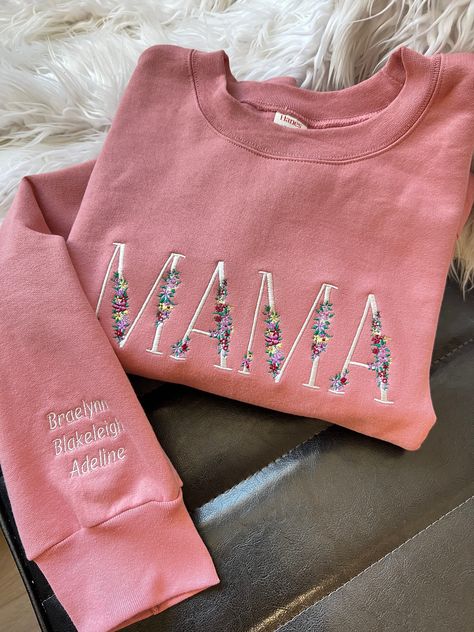 MAMA Floral Crewneck Sweatshirt with Children Names Sleeve Embroidery Custom Gift Soft and cozy, 9oz cotton with poly thread 90/10 cotton poly *shown in mauve Gildan or Hanes brand Comfort Colors and Bella available with custom listing and slight price increase. Sweatshirt With Embroidery, Embroidery Designs On Sweatshirts, Embroidery Business Names, Embroidery Shirt Ideas, Custom Embroidered Sweatshirt, Embroidery Designs Shirts, Mama Embroidery, Sleeve Embroidery Designs, Embroidery Business