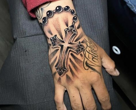 Rosary Tattoo For Men Arm Half Sleeves, Cross With Crown Of Thorns Tattoos For Men, Hand Tattoos Rosary, Christian Hand Tattoos For Men, Solid Tattoo Ideas, Rosary On Hand Tattoo, Small Hand Tattoos For Guys For Men, Christian Hand Tattoos For Guys, Rosery Tattoos Hand