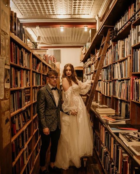 Elopement☽Wedding Photographer on Instagram: "The kind of love you only find in books… and this couple. More magic ✨ ⁣ Venue:⁣ @eltorreonkc Catering:⁣ @taylormadecateringkc ⁣Video: @austin.alan ⁣ #weddinday #vintagewedding #rainbow #rainbowbridephotos #rainbowweddingday #kcwedding #kansascitywedding #kcweddingphotographer #travelweddingphotographer #vintagebride #vintageweddingphotographer #eltorreon #bookstore #vintagebookstore #cottagecore" Old Library Wedding, Grocery Store Wedding Photos, Bookstore Wedding Photos, Engagement Photos Books, Wedding In A Library, Book Store Engagement Photos, Bookstore Engagement Photos, Dark Academia Engagement Photos, Library Wedding Aesthetic